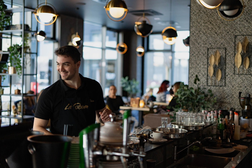 Smiling man at a restaurant