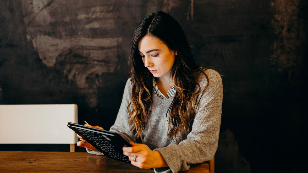 Woman smilling in front of cashier