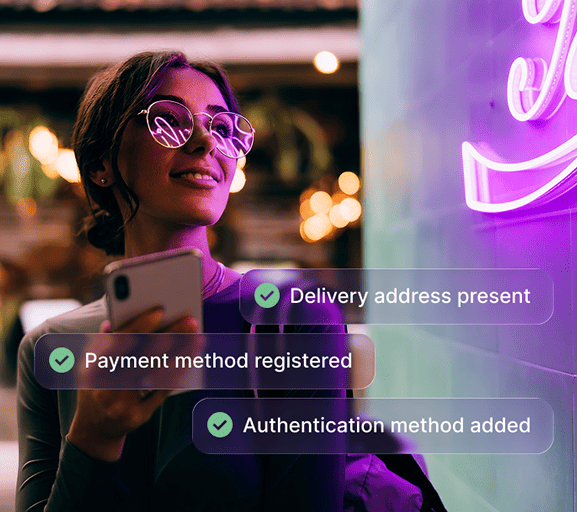 Woman using a smartphone with her delivery, payment and authentication details confirmed