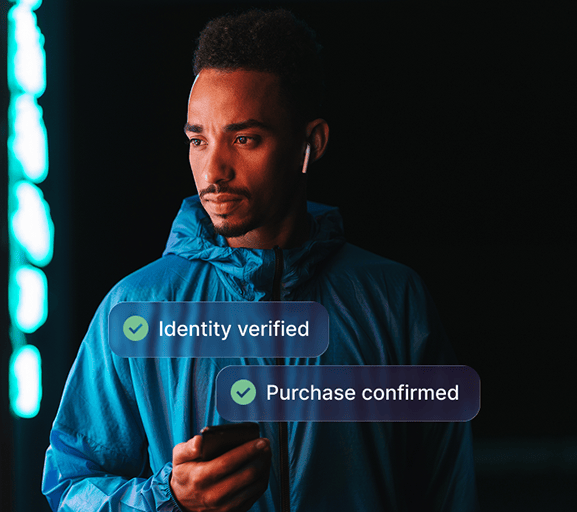 Man using a smartphone, with a identity and purchase confirmed