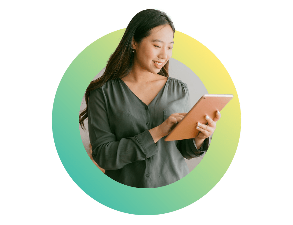 modern businesswoman looking at the camera while holding a digital tablet