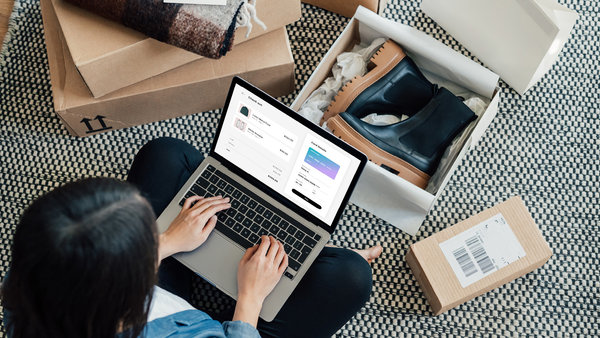 woman making a purchase in her laptop
