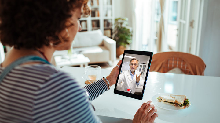woman talking to her doctor on a video call