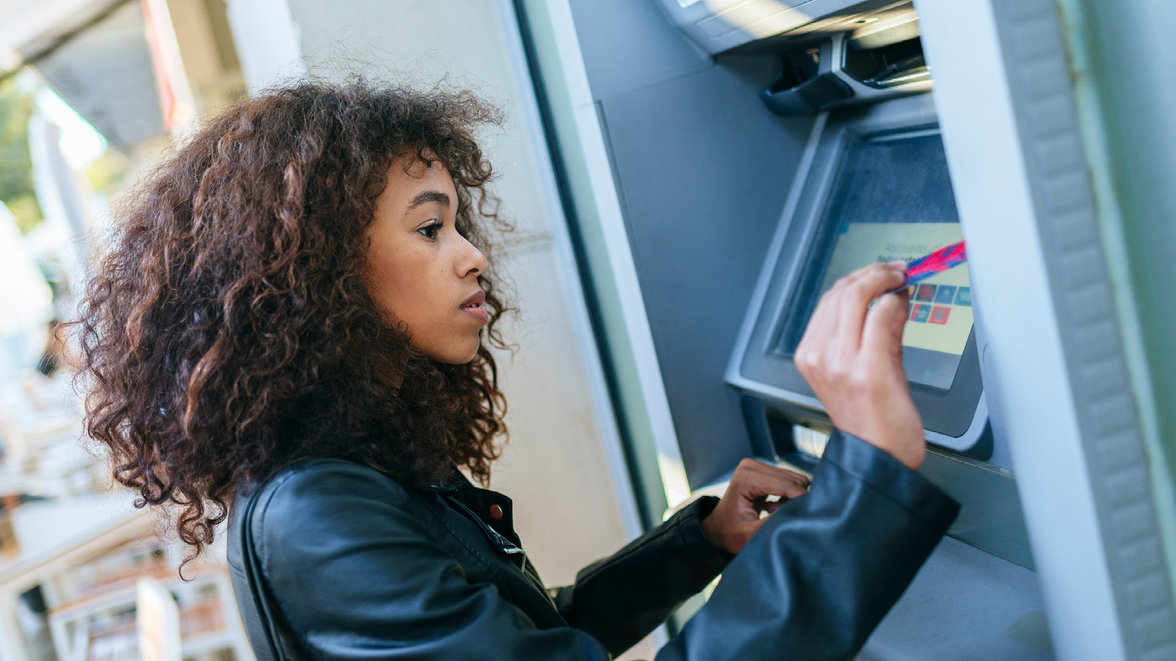 womand using the ATM