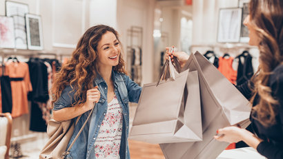 Young woman in a clothes shop