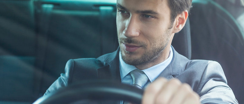 Man driving thinking about SEPA position of Switzerland