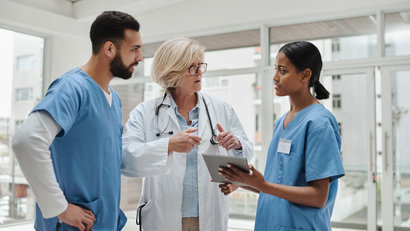 group of medical practitioners having a discussion in a hospital