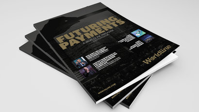 Futuring payments magazine on a grey background