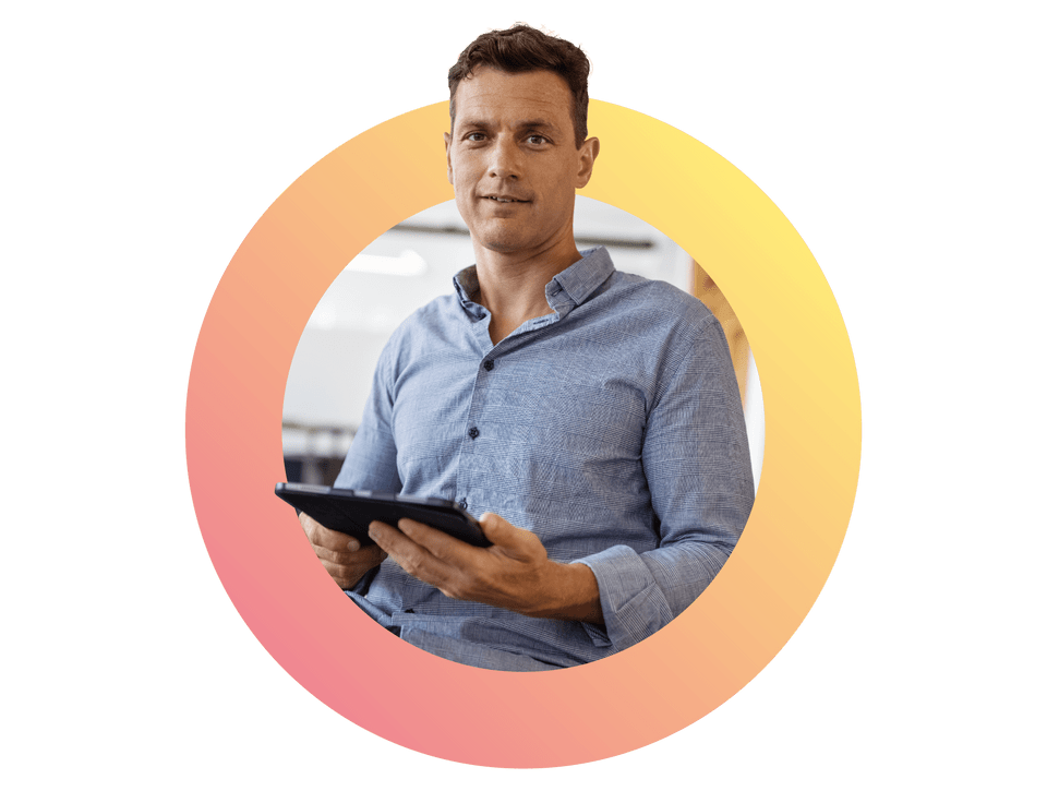 portrait of a confident mid adult businessman holding a digital tablet