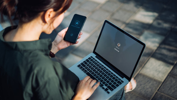 woman authentication on a laptop